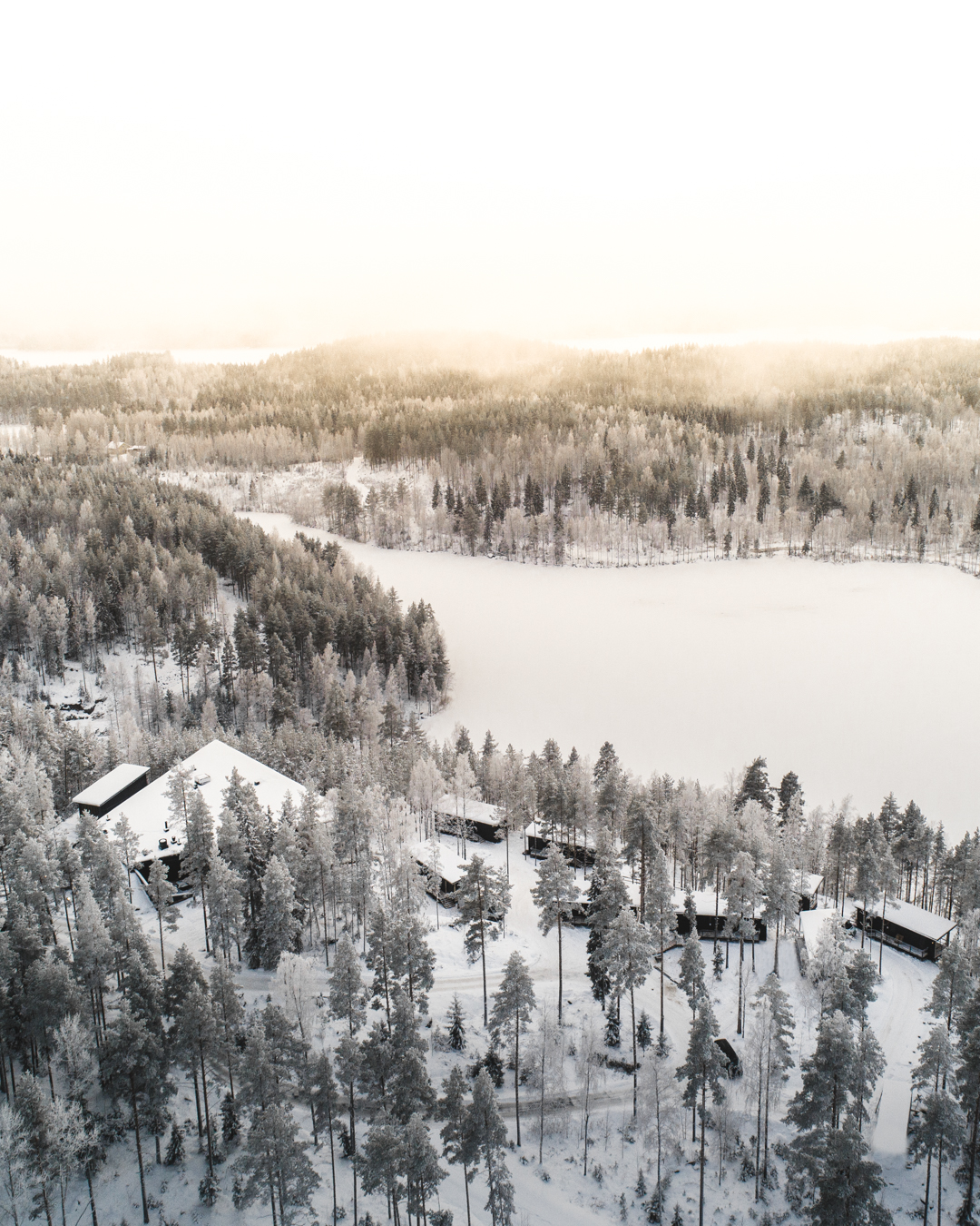 Kuru Resort forest villas in snow with private spa